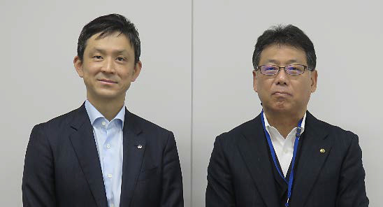 尾家健太郎社長(左)、松林克次上席執行役員