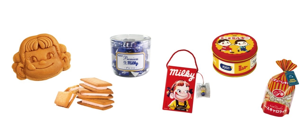 左から「ペコちゃん人形焼」、「プレミアムミルキーバターサンド」、「プレミアム生ミルキー」、「復刻 手提げミルキー」、「ミルキー缶(レトロペコポコデザイン)」、「復刻 ノースキャロライナ」