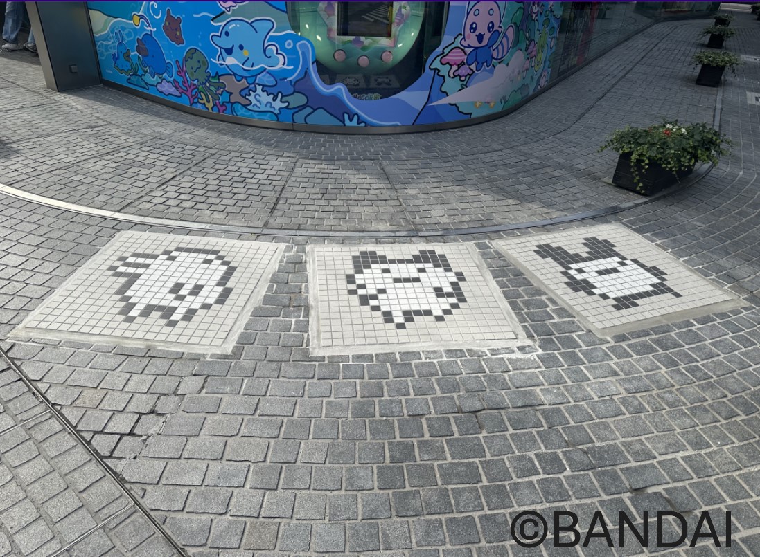 「CO2を食べる自販機」のCO2吸収材を活用したバンダイの「たまごっち」タイルアート